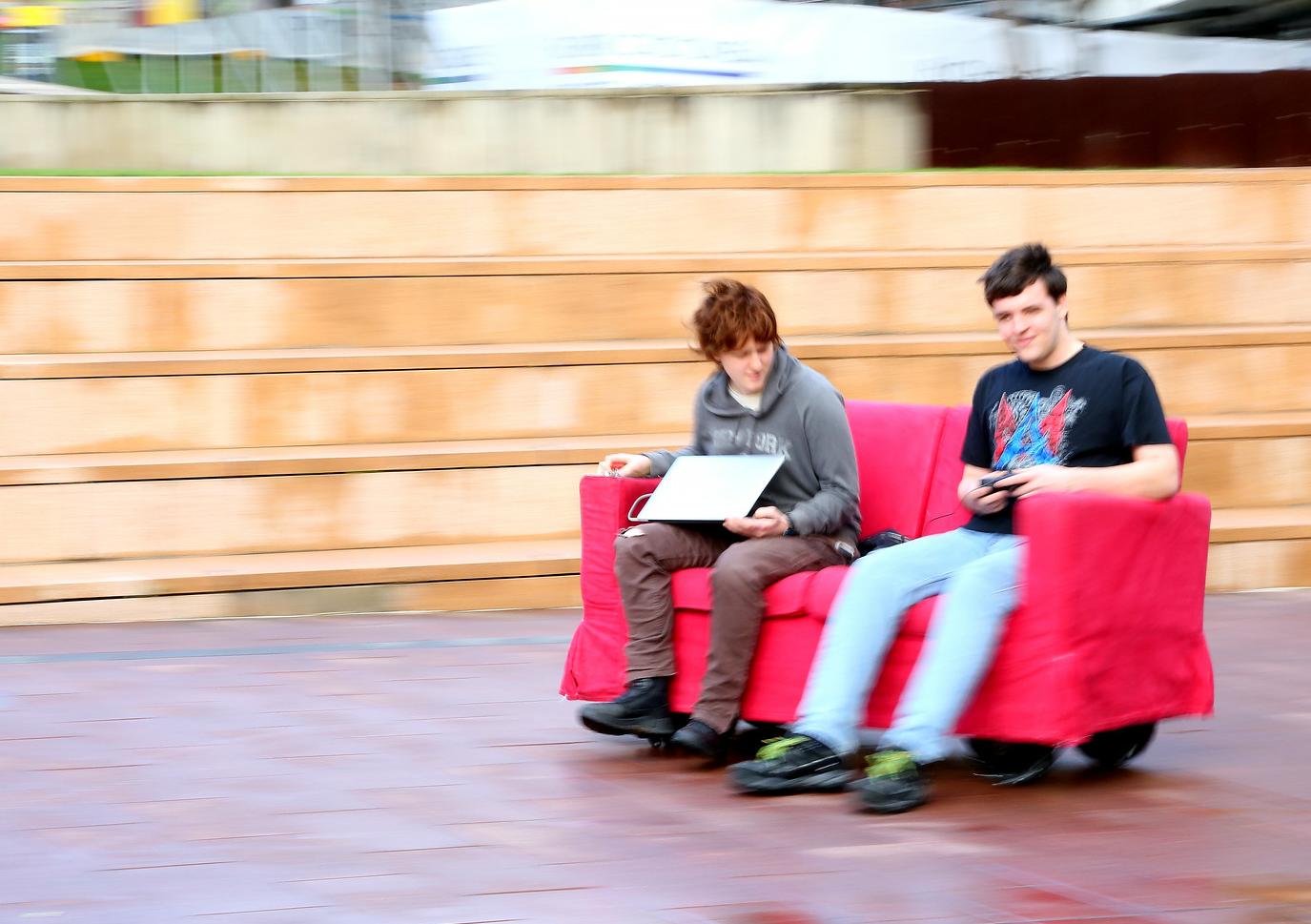 Engineering students Laura Hodges and Fred Westling drive the RoboCouch. Photo: Leilah Schubert)